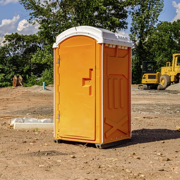 how often are the porta potties cleaned and serviced during a rental period in Wilder